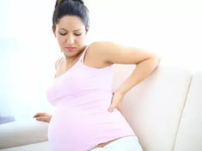 Wie entlasten Sie Ihren schwangeren Rückenschmerzen?